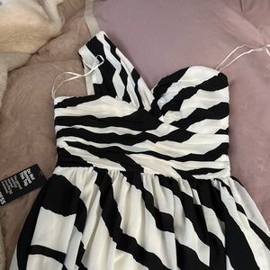 Single strap black and white cocktail dress. Brand new, never worn.